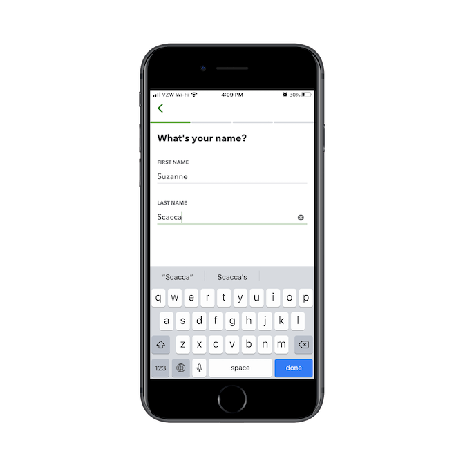 The QuickBooks mobile app asks for the user’s name during onboarding.