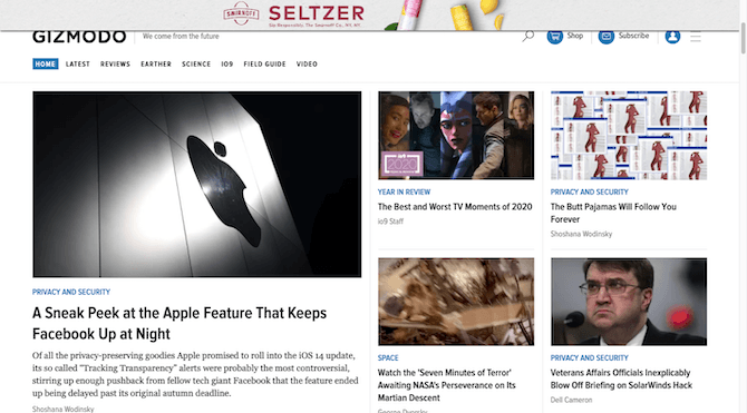 Gizmodo homepage visitors can scroll past Smirnoff seltzer ad, but then it slides back into view and covers part of the navigation.