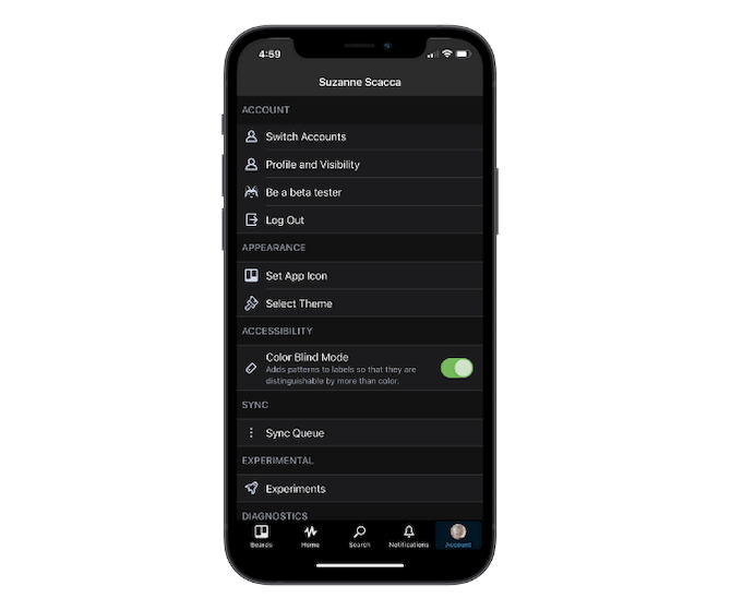 This is what the Trello mobile app looks like when the dark theme and color blind mode are enabled. Black background, white text, green toggle switch.