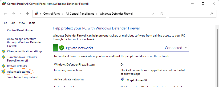 The control panel page for Windows Defender with the heading Help Protect Your PC with Windows Defender Firewall. In the menu down the left hand side, the second last item (labeled Advanced Settings is cricled)