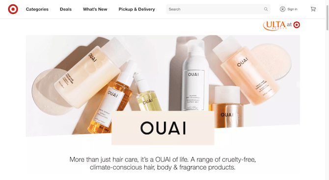 When a target shopper looks up the OUAI brand, they’ll encounter this full-width promotional banner for the company. Various product bottles are shown scattered across an off-white tabletop. The image is followed by text that reads “More than just hair care, it’s a OUAI of life. A range of cruelty-free, climate-conscious hair, body & fragrance products.