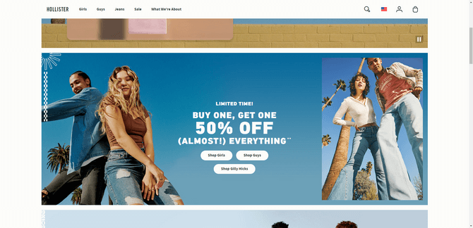 A screenshot from the Hollister ecommerce site home page. There are two images of a young man and a woman standing against a blue sky with palm trees in the background. The text reads: “Limited Time! Buy One, Get One 50% Off (Almost!) Everything”. There are three buttons for “Shop Girls”, “Shop Boys”, and “Shop Gilly Hicks”.