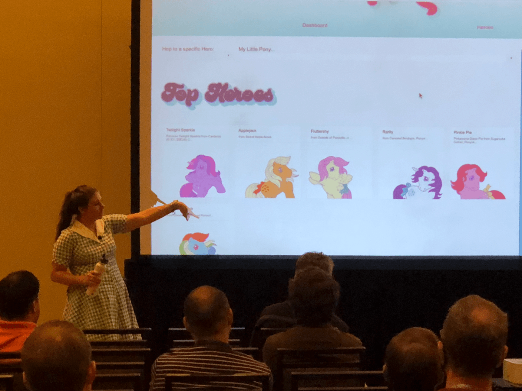 Alyssa Nicoll giving a talk in front of a My Little Pony slide