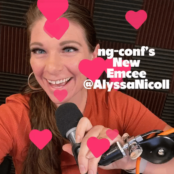 ng-conf's new emcee @AlyssaNicoll - Alyssa with a mic and hearts float up the screen