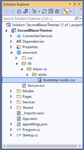 Visual Studio’s Solution Explorer pane showing a single solution with a single project. The Projects wwwroot folder has been expanded to show a css and a lib folder. The lib folder has been expanded to show a blazor-ui folder which has been expanded to show a styles folder. Inside the styles folder is a file called bootstrop-nordic.css.