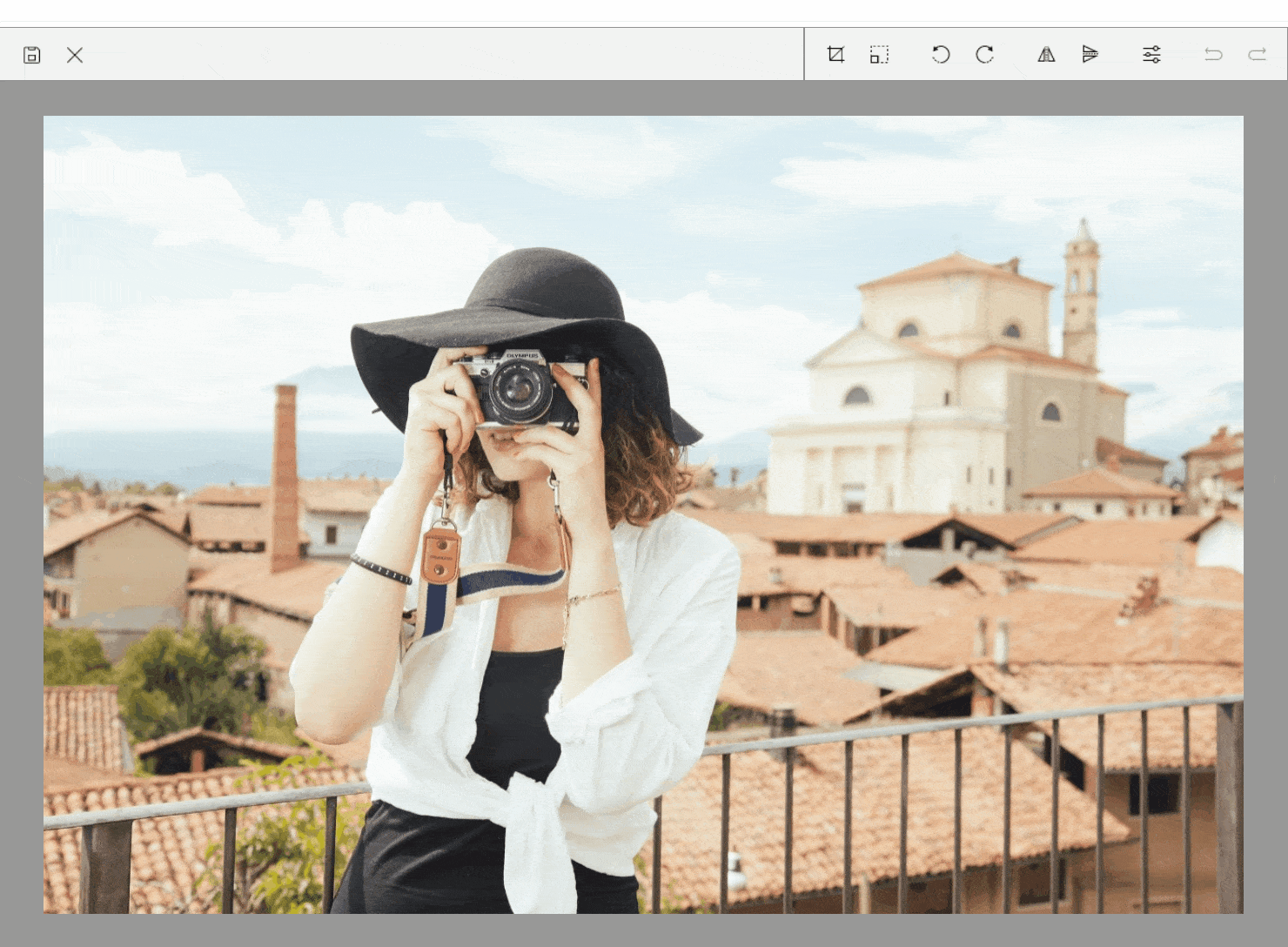 ImageEditor shows image of a person taking a picture with a camera