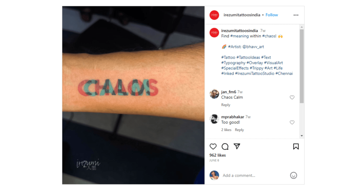 A tattoo from the Instagram page called @irezumitattoosindia. The word “chaos” appears in all caps and red lettering. Behind it is the word “calm” in all caps and blue lettering.