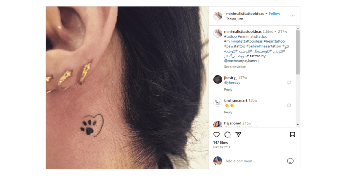 The @minimalisttattooideas page on Instagram shared this tattoo from @nastaranpaykanou. It’s a dog’s paw print inside a partial heart.