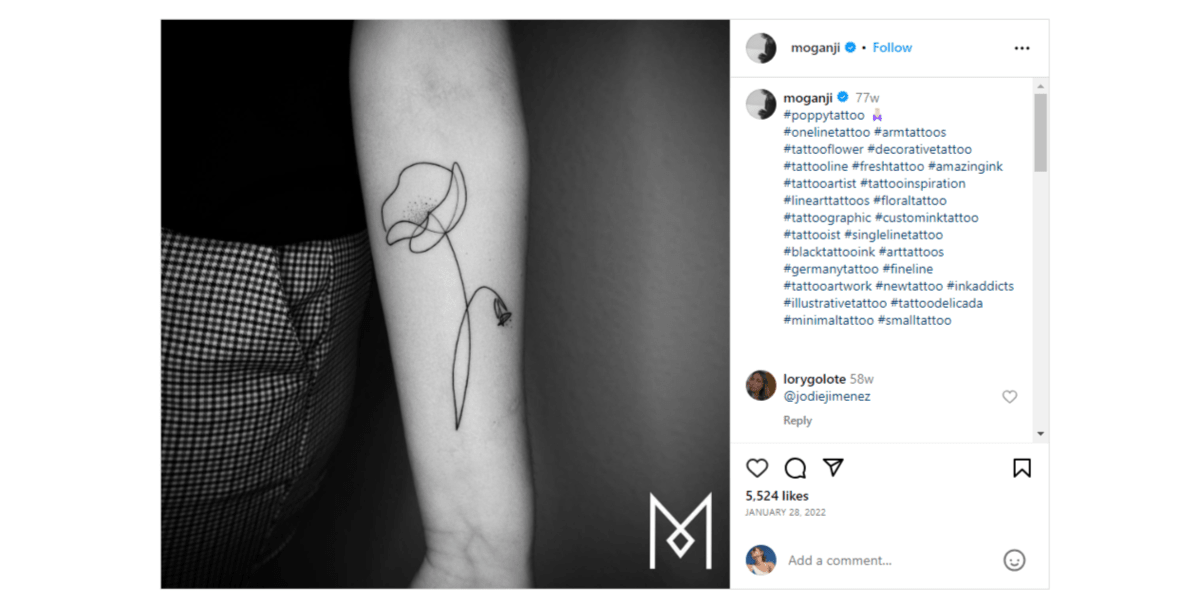From the Instagram page of @moganji, this is a line art drawing of a poppy flower. The entire tattoo is made using a single line.