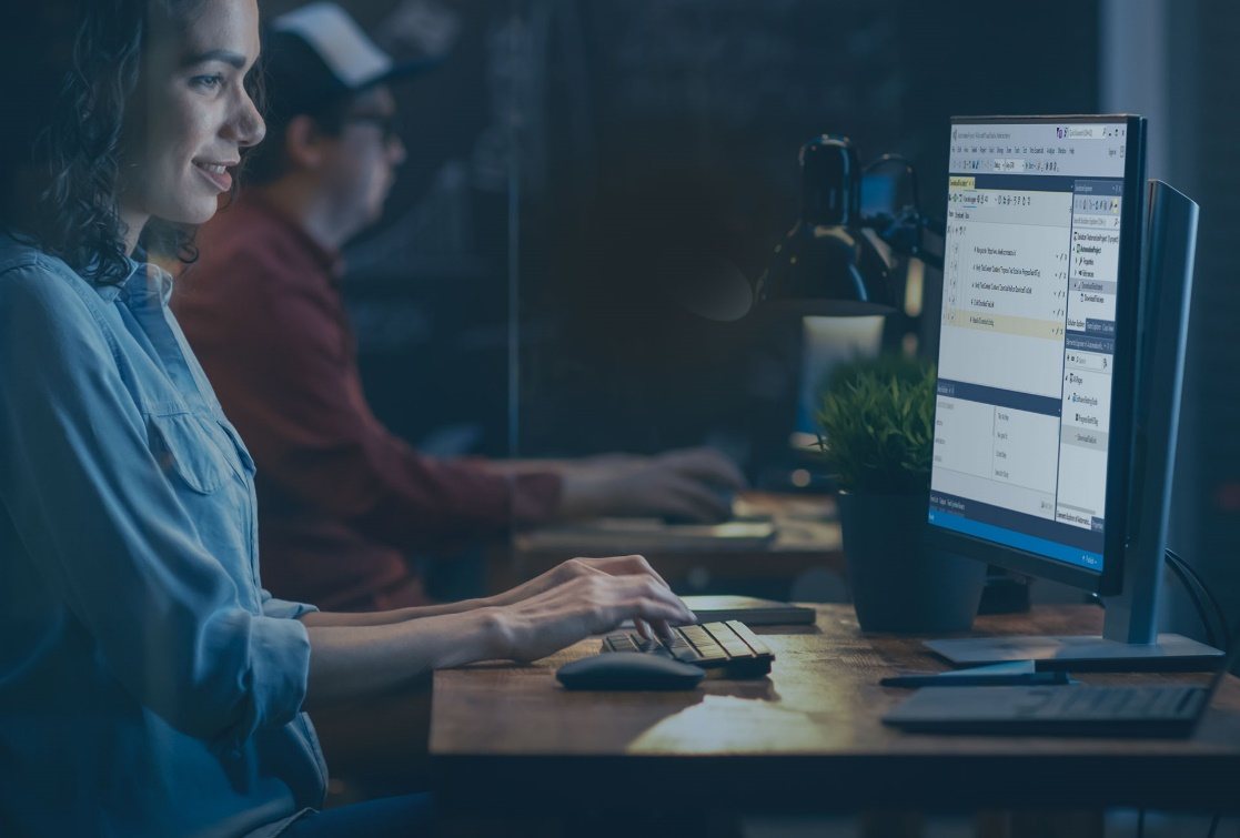 Woman at a computer with Test Studio open