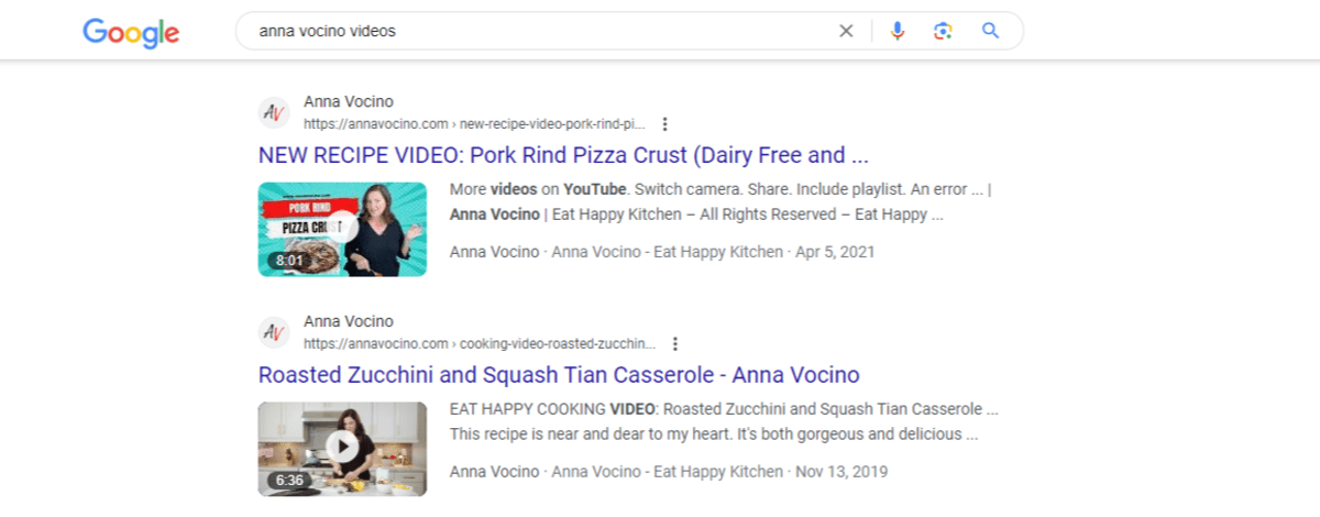 A Google search for “anna vocino videos”. Two video pages from her website appear. One is “NEW RECIPE VIDEO: Pork Rind Pizza Crust (Dairy Free and…” and the other is “Roasted Zuccini and Squash Tian Casserole - Anna Vocino”.