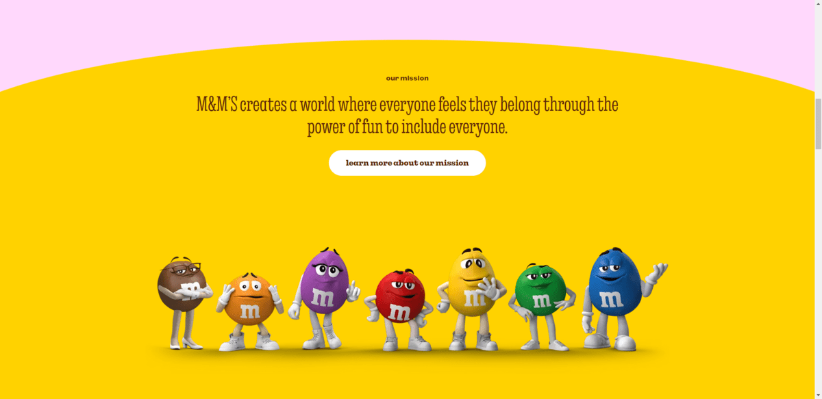 At the top of the section, it says:  “M&M’s creates a world where everyone feels they belong through the power of fun to include everyone.” There are M&M characters below in every color and shape: brown, orange, purple, red, yellow, green, and blue.