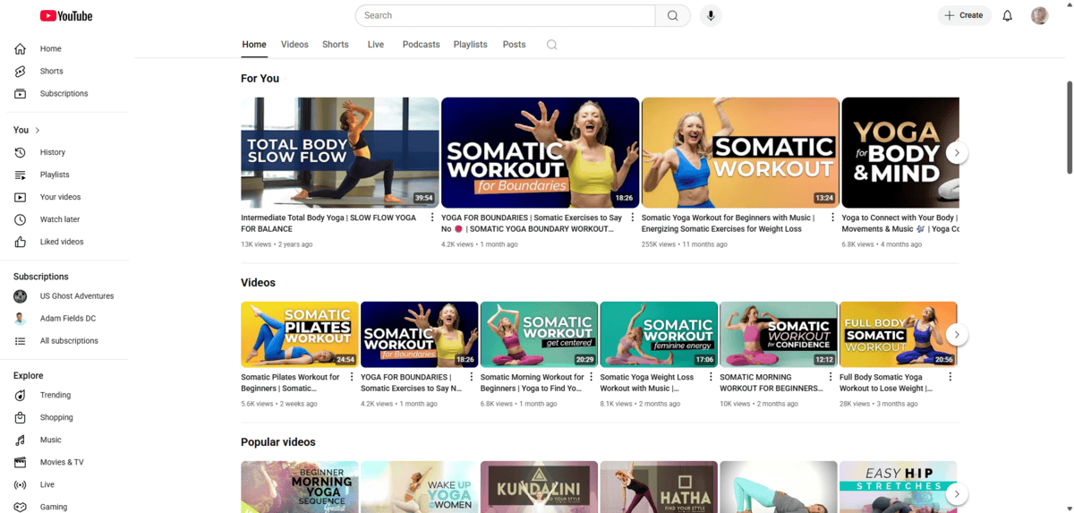 A screenshot of the videos found on the @brettlarkinyoga YouTube channel. We see videos like Somatic Workout for Boundaries, Somatic Yoga Weight Loss, and Yoga for Body & Mind.