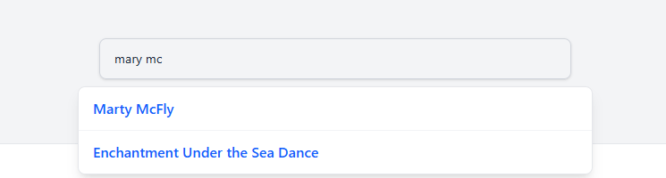 Search box where user has entered mary mc, and suggestions come up for Marty McFly and Enchantment Under the Sea Dance