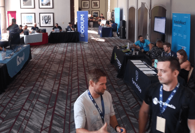 Attendees talking in Sponsor Hall at React Rally 2019 Sponsor Hall at React Rally 2019