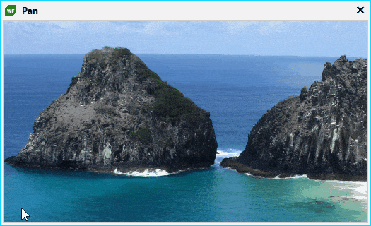 We see a user grabbing a point in the image of a coastline and dragging to pan across the image. This is shown vertically, horizontally and at an angle.